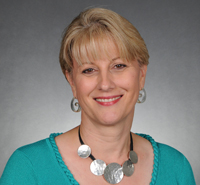 Management Team - Mitzi Tally, EVP Administrative Services